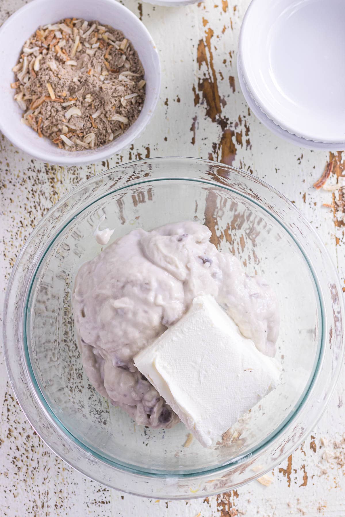 The cream of mushroom soup and cream cheese in a bowl.