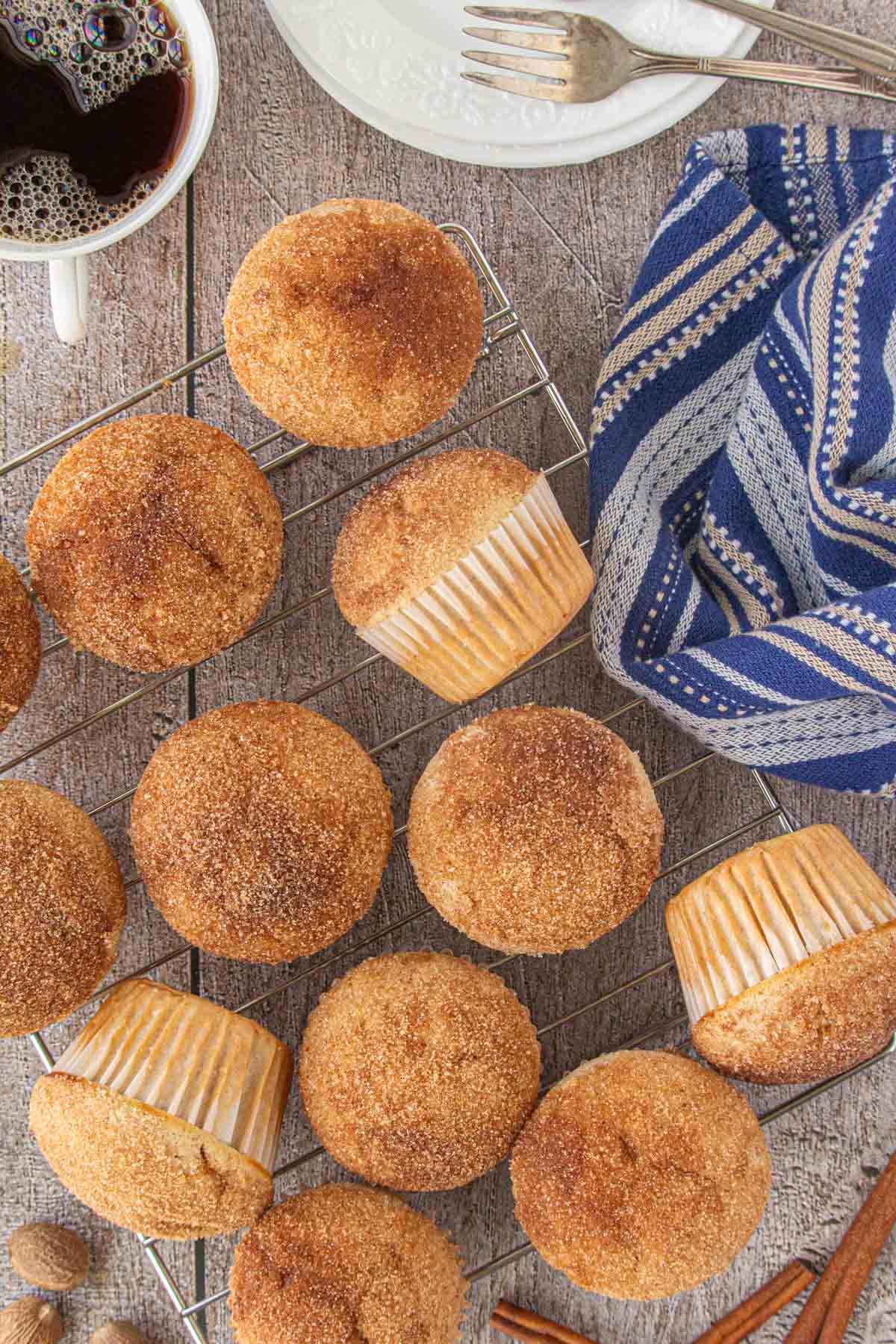 An overhead view of French breakfast puffs on a cooling rack.