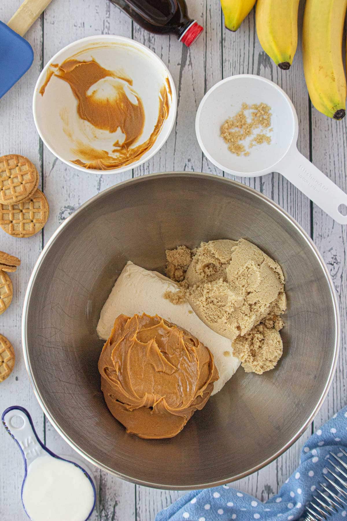 Cream cheese, peanut butter, and brown sugar in a mixing bowl.